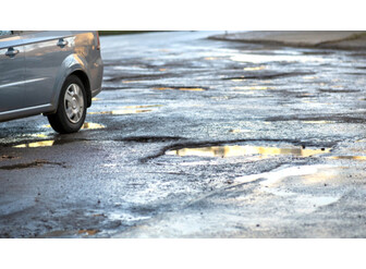 Car Wheel on Asphalt