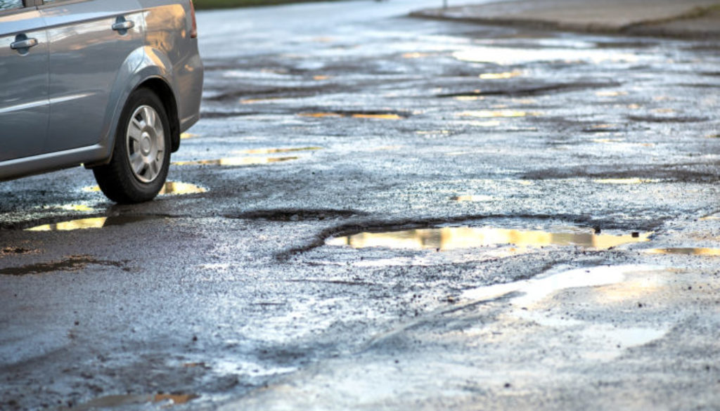 Car Wheel on Asphalt